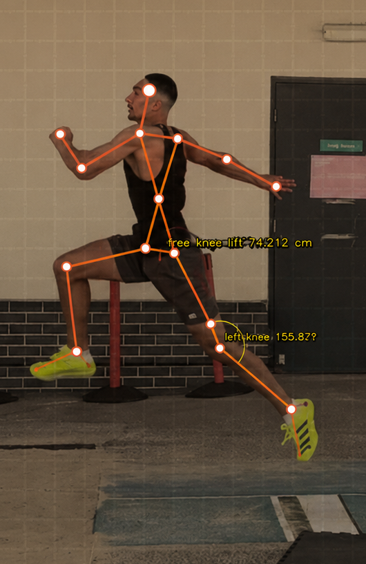 Long jumper mid-flight with pose analysis overlay